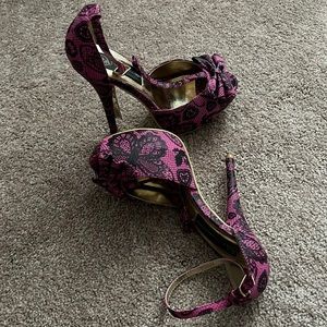 Pink heels black butterfly and heart designs